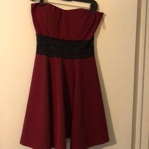 Red dress with black lace in the middle